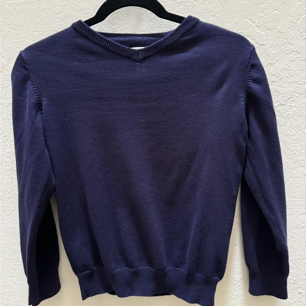 Gently used boys sweater. Blue v neck sweater. Boys size 7/8.